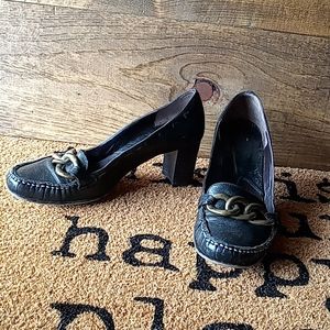 Mule style moccasin heels with brass colored chain